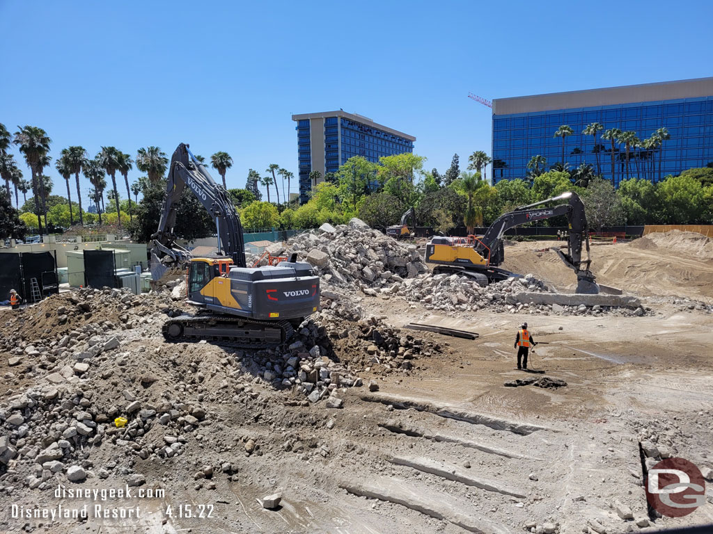 Excavators working on removing the foundations and other concrete.