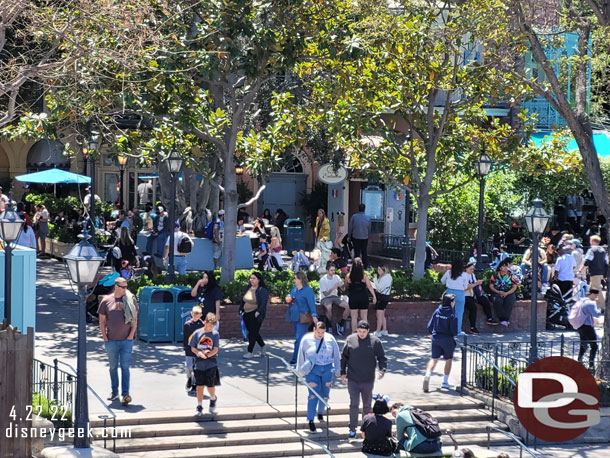 The walls around the formerly raised sections on the upper terrace are gone. There are now planters around the trees and the walkway is all flat.