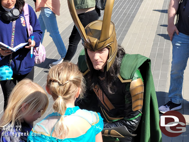 Loki visiting with guests.