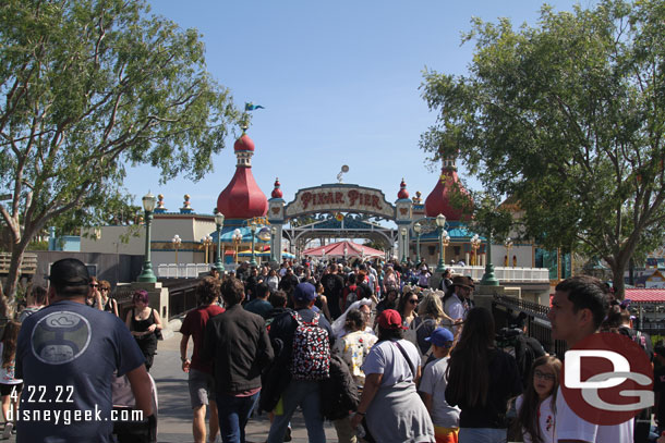 A healthy crowd moving around the park this afternoon.