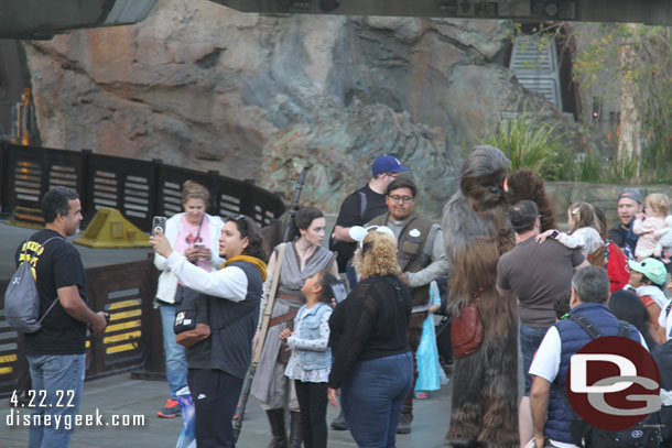 Rey and Chewbacca out near the Millennium Falcon