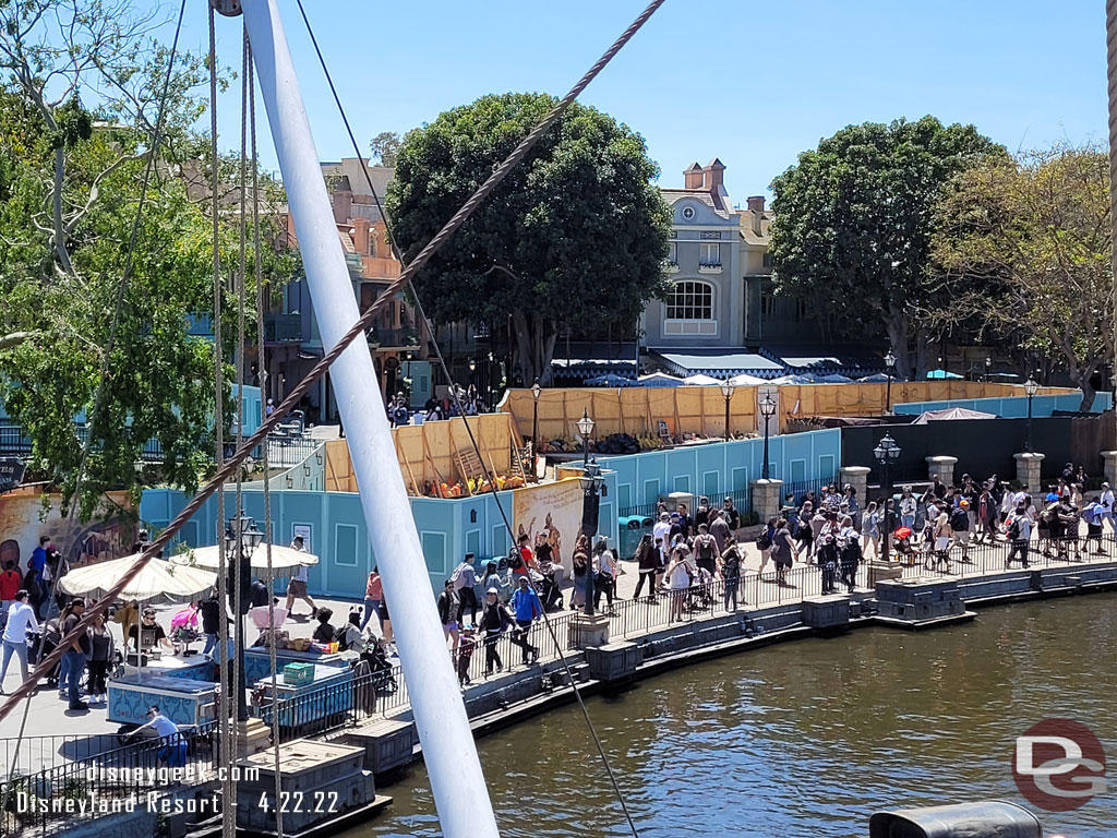 The walls have been moved and they are working on the walkway closer to the attraction attraction entrance now.