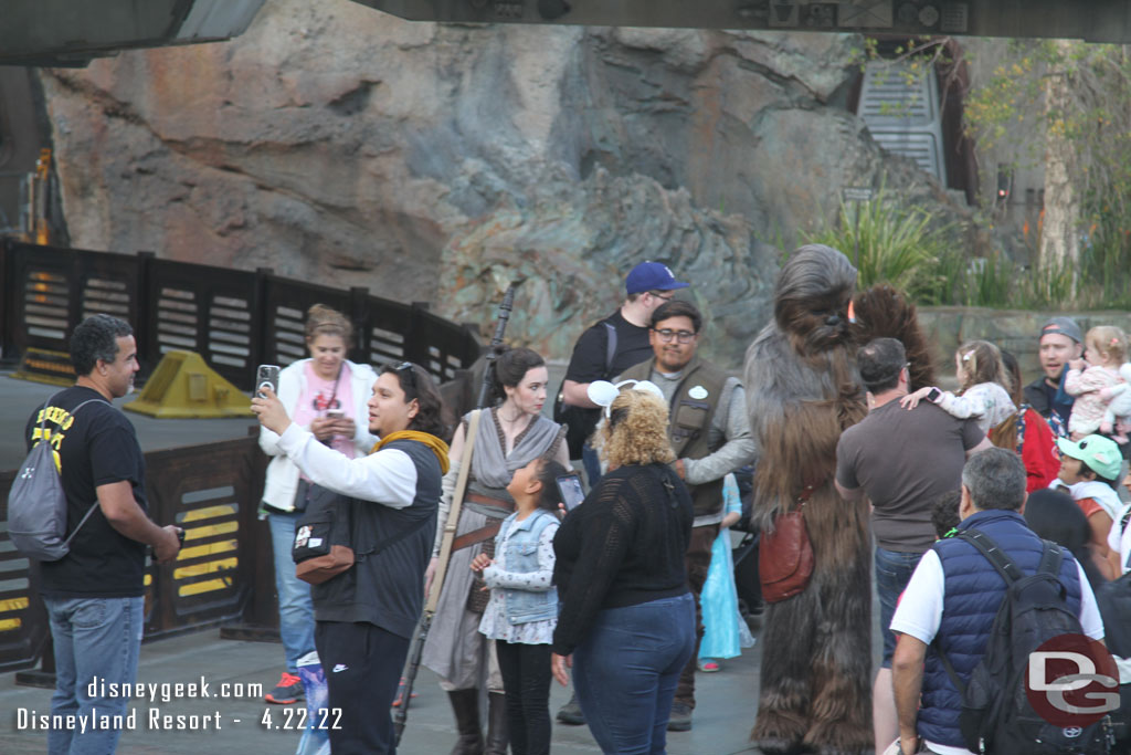 Rey and Chewbacca out near the Millennium Falcon