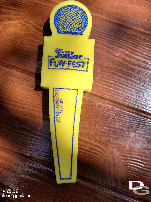 They were handing out these foam microphones to guests in the area.