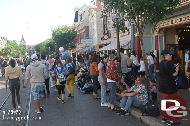 4:20pm a lot of the curb seating in the shade is taken up with guests waiting for the 8:30 parade.