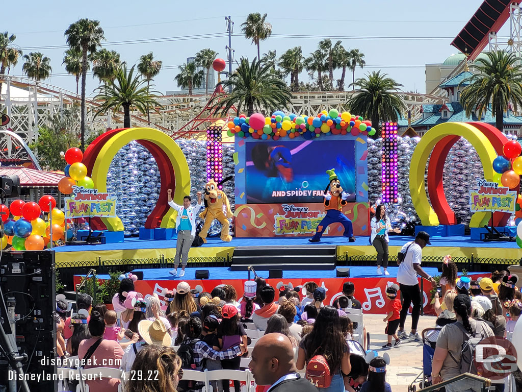 Pluto and Goofy performing