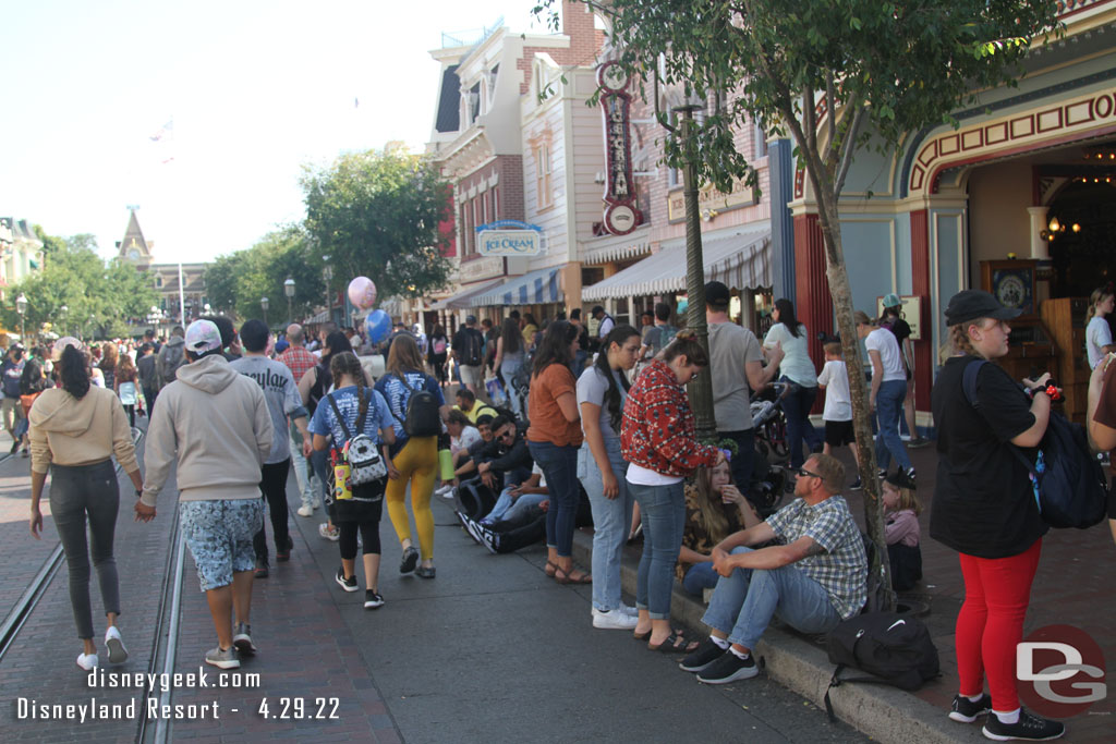 4:20pm a lot of the curb seating in the shade is taken up with guests waiting for the 8:30 parade.