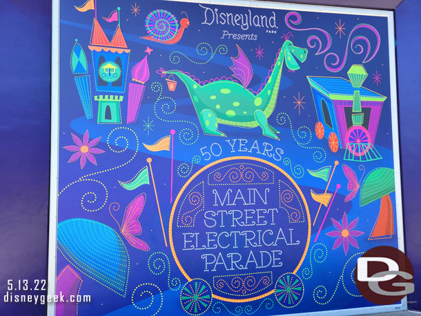 A mural on the former ESPN building celebrating the return and 50th anniversary of the Main Street Electrical Parade.