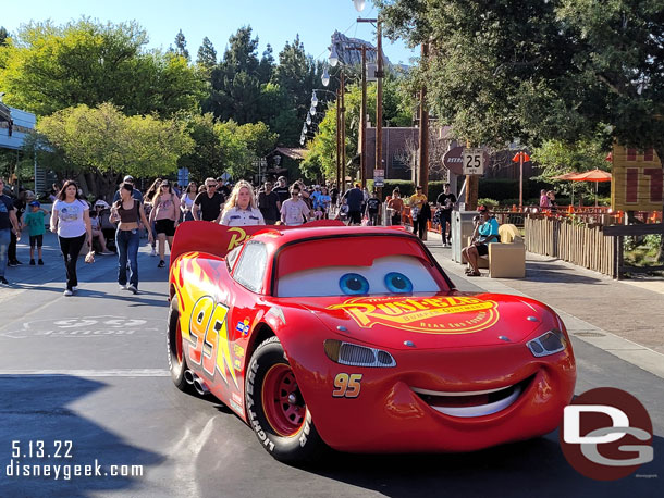 Lightning McQueen turning onto Cross Street in Cars Land