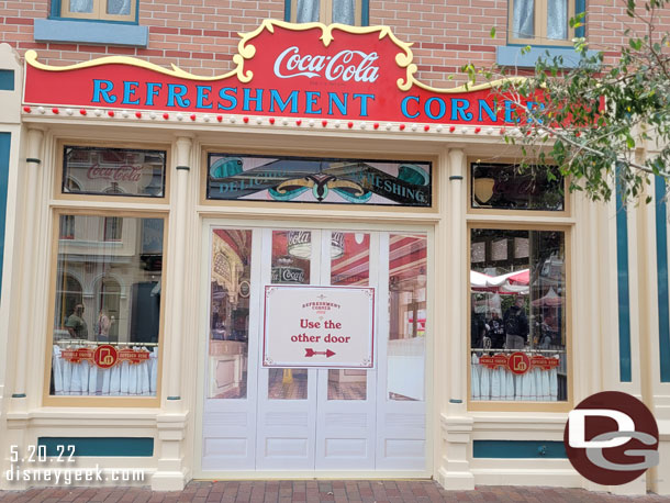 The doors for Coke Corner are currently removed and they are renovating the entrance.  So you have to use the other side.