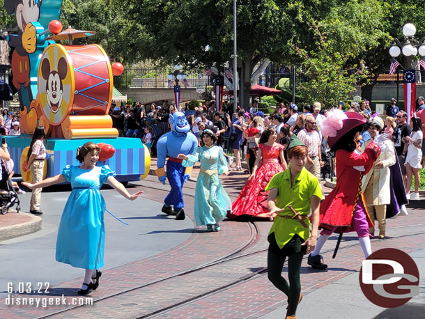 Mickey and Friends Cavalcade passing by.