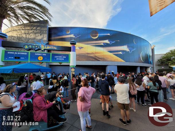 All those people are in the Lightning Lane return queue for Buzz Lightyear.