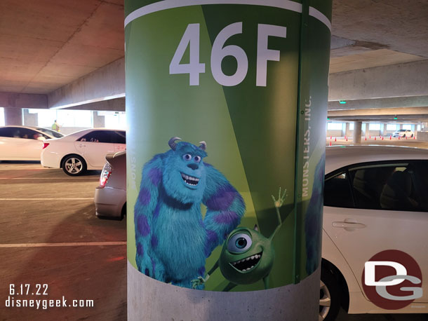 Directed into one of the last spots on an aisle in the Pixar Pals parking structure.