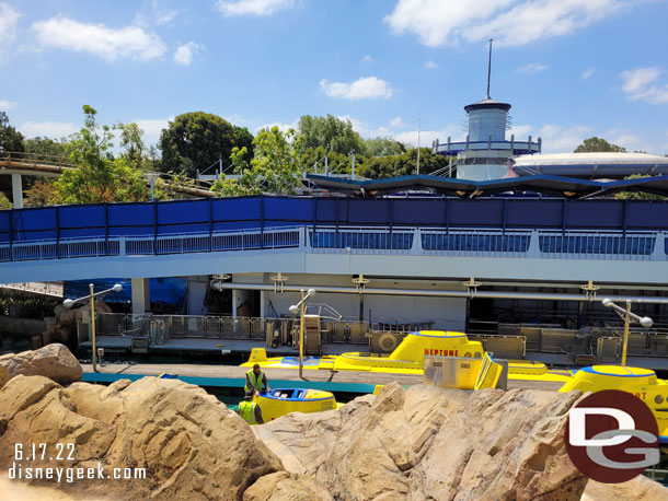 Activity at the Finding Nemo Submarine Voyage this morning.  A couple subs were in motion and teams working on others.  Still no reopening date.