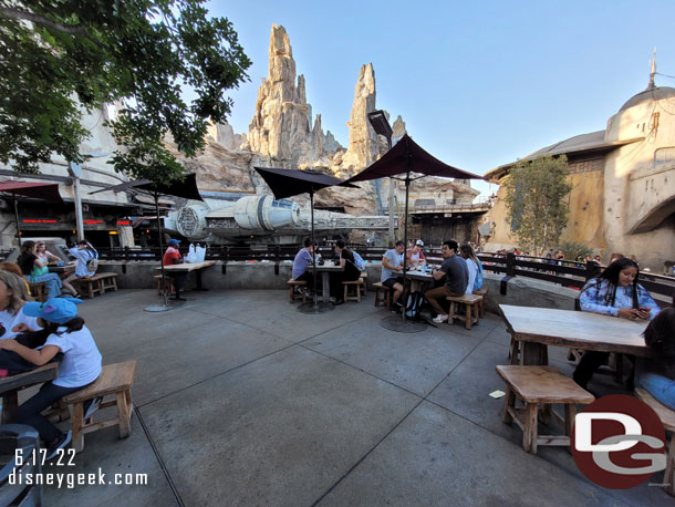 An interesting comparison of WDW vs Disneyland.  In Anaheim there are tables, chairs and umbrellas with a view.  At WDW this area is blocked off for PhotoPass.