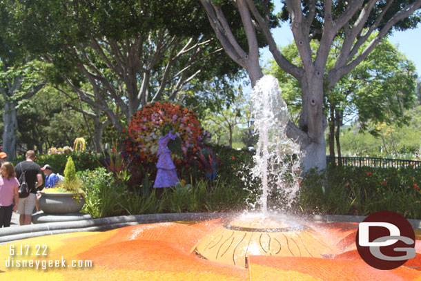 Downtown Disney features a series of Floral Displays telling the story of Isabela from Encanto with vibrant silletas.  Each silleta represents a different Business Employee Resource Group at the Disneyland Resort and across the company.