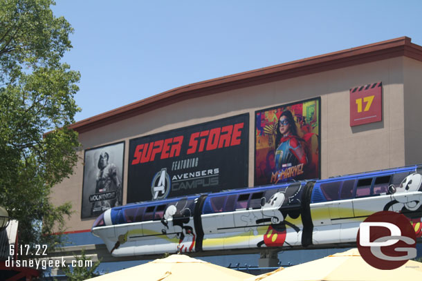 Super Store sign features Moon Knight and Ms. Marvel