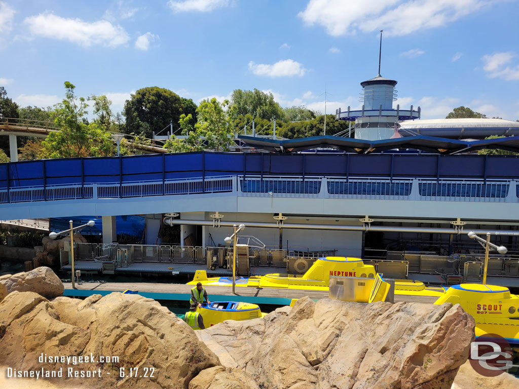 Activity at the Finding Nemo Submarine Voyage this morning.  A couple subs were in motion and teams working on others.  Still no reopening date.