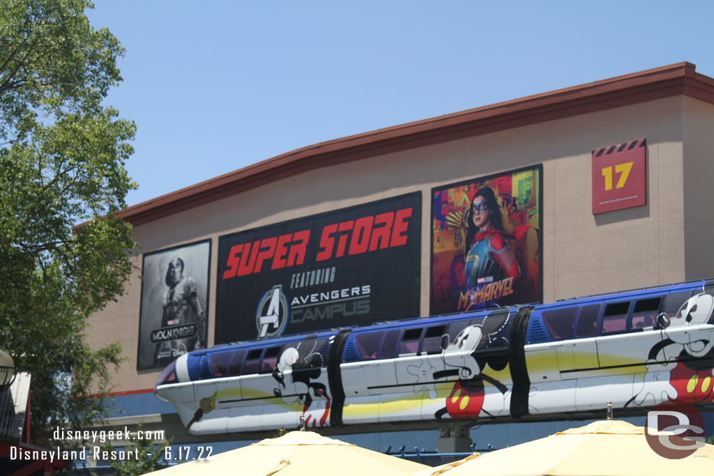 Super Store sign features Moon Knight and Ms. Marvel