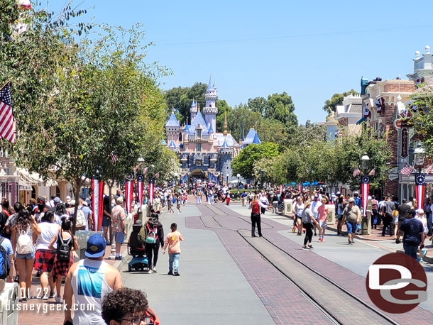 Mickey and Minnie leading the Disneyland Band around Main Street USA