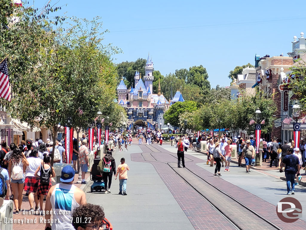 Mickey and Minnie leading the Disneyland Band around Main Street USA