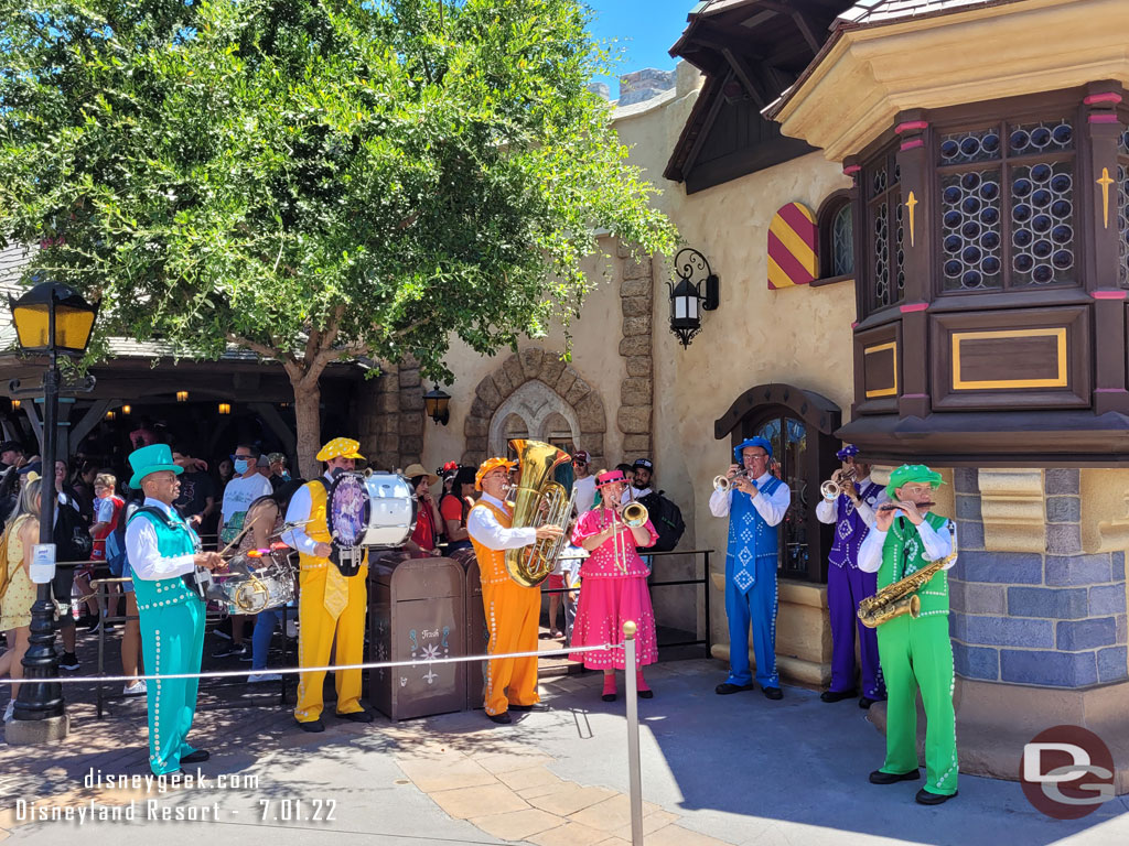 The Pearly Band performing near the Peter Pan queue. The managed to find a little shade for themselves.