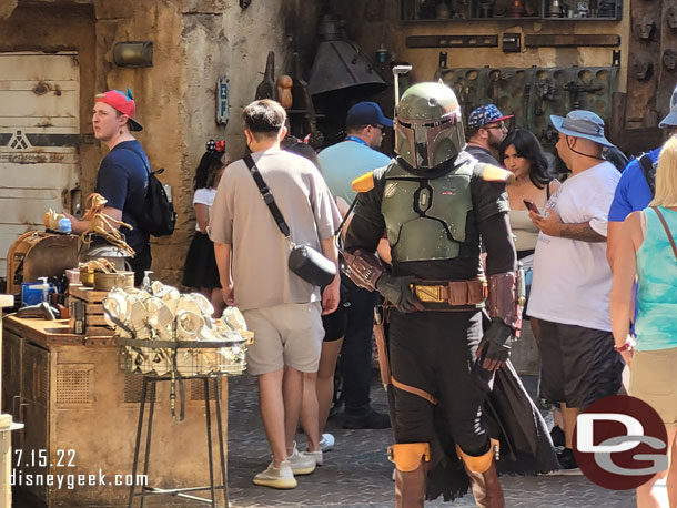 Bob Fett doing some shopping in the marketplace