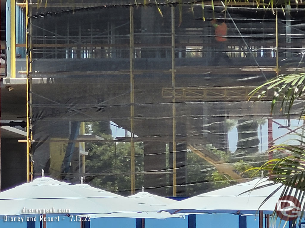 You can see through to the back courtyard.  There is a mesh up on the scaffolding.