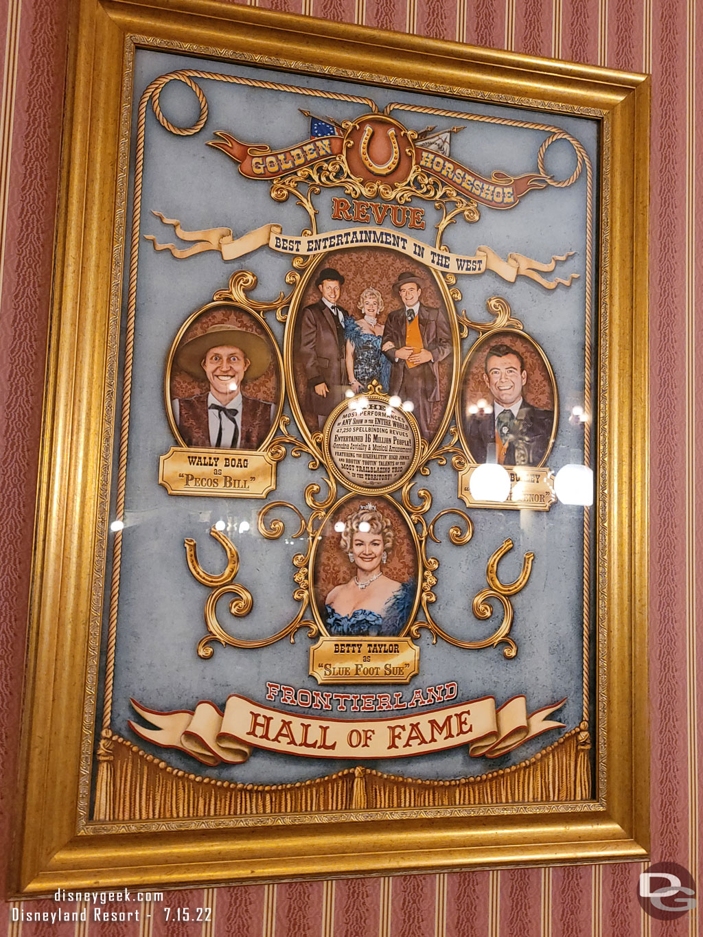 Stopped by the Golden Horseshoe to grab a snack and ended up seated under the Golden Horseshoe Review Frontierland Hall of Fame poster.