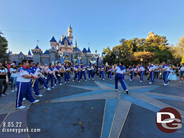 The 2022 Disneyland Resort All-American College Band performing in front of Sleeping Beauty Castle.