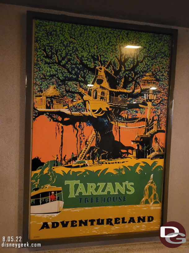 Tarzan's Treehouse attraction poster is still up at the park entrance.