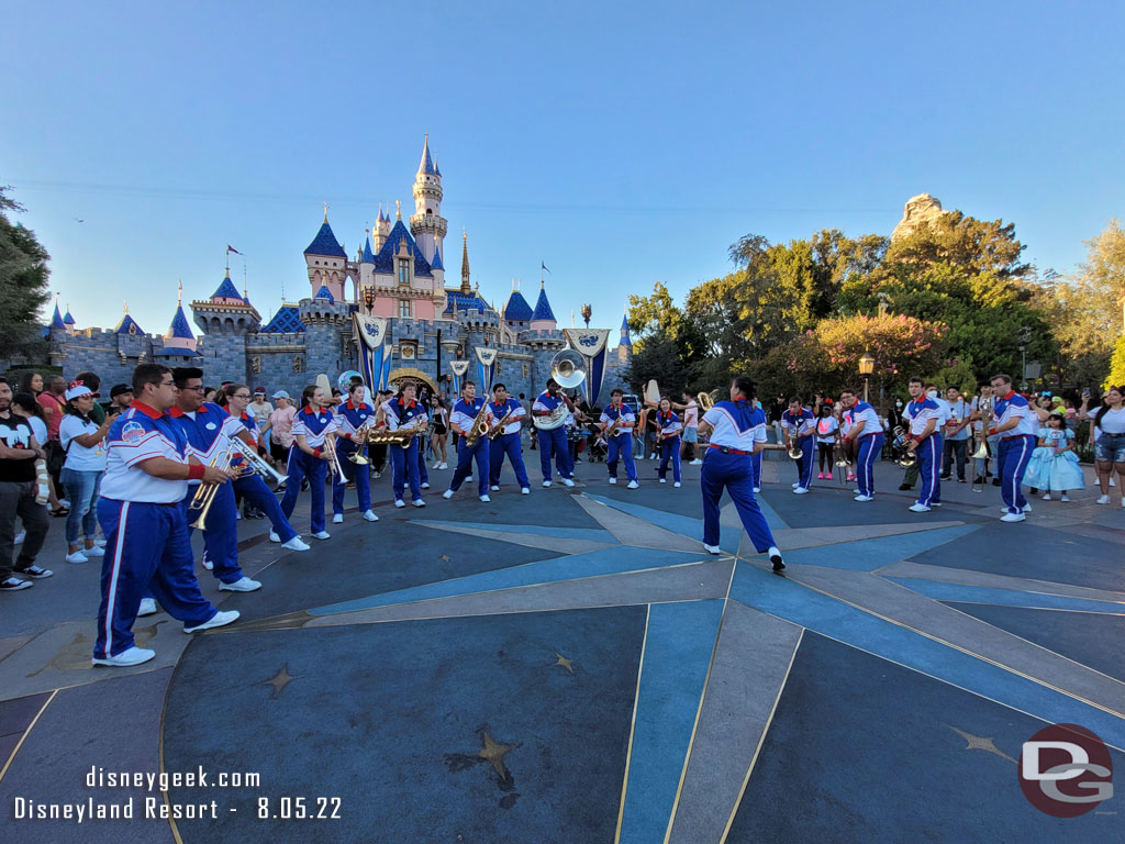 The 2022 Disneyland Resort All-American College Band performing in front of Sleeping Beauty Castle.