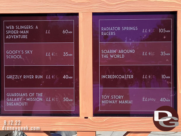 The screen along the parade route had wait times for some attractions.