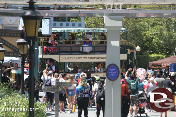 The Mickey and Friends Cavalcade rolling by.