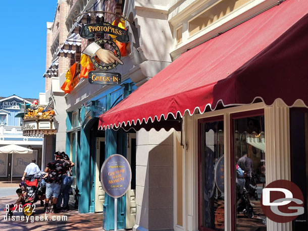 The old Photopass sign has found a new home promoting the photo sessions and marking the check in area.