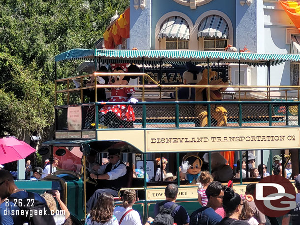 Mickey and Friends Cavalcade passing by.