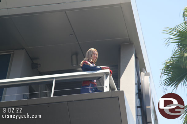 Captain Marvel looking over Avengers Campus