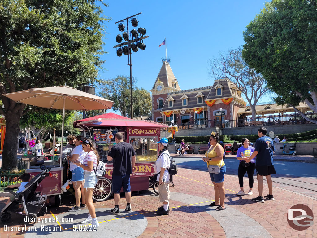 A handful of guests in line for the Mummy Mickey popcorn bucket.