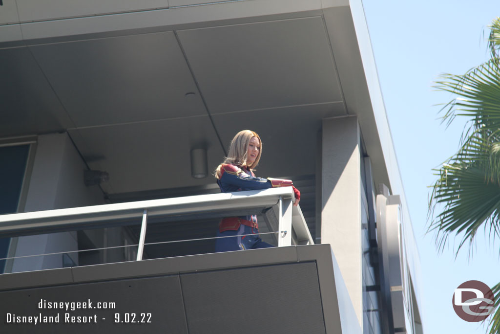 Captain Marvel looking over Avengers Campus