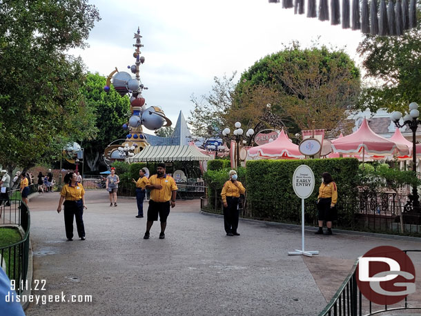 Early entry is on the Tomorrowland side and several cast members are there to verify your hotel stay and let you in.