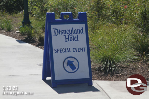 A sign along the walkway for an event.