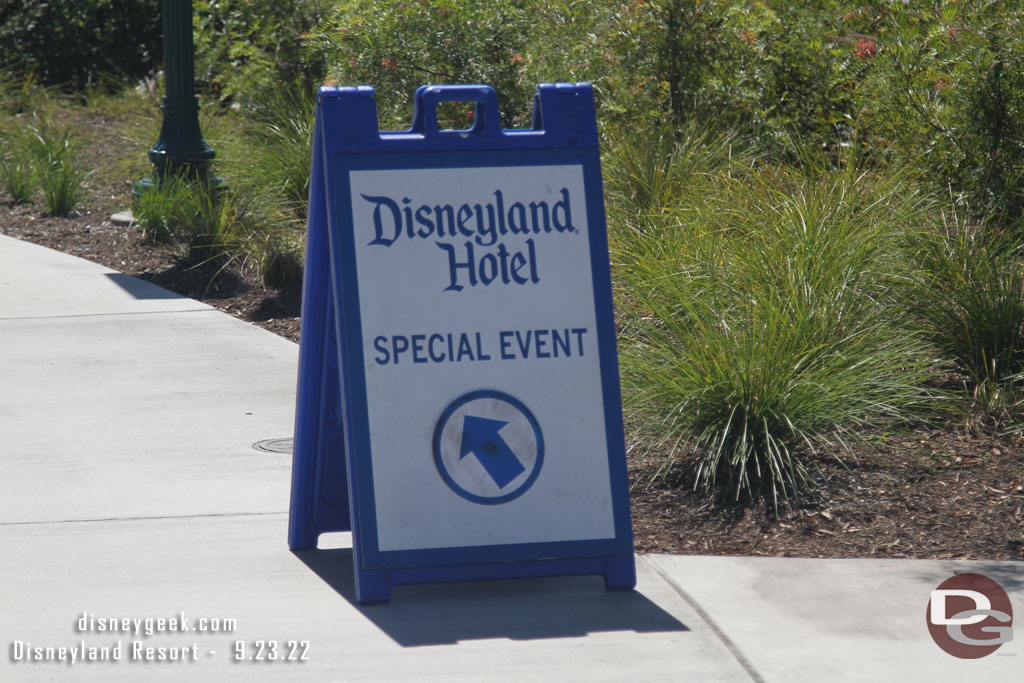 A sign along the walkway for an event.