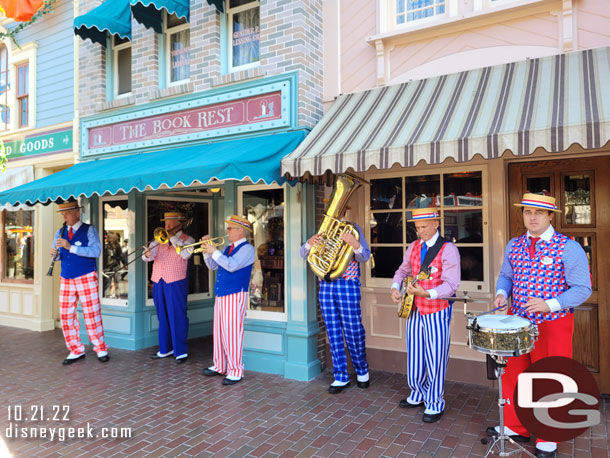 The Straw Hatters performing along Main Street USA