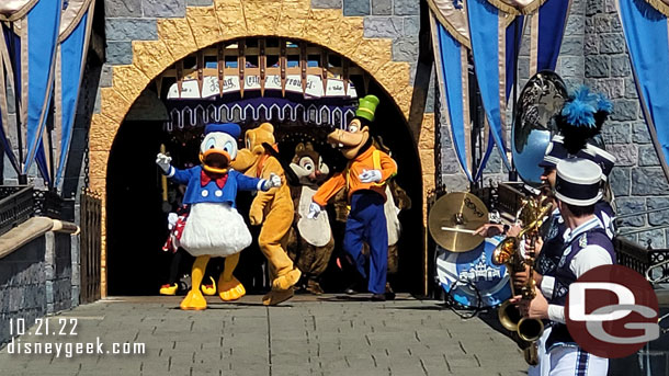 Donald Duck and Goofy lead the Characters out.