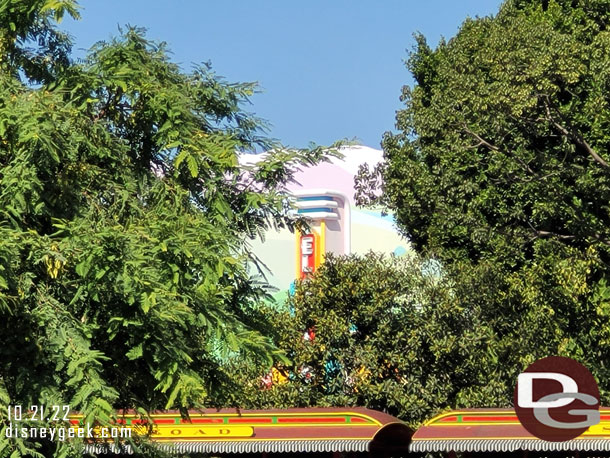 The El Capitoon theater marquee is installed. You can see the few letters through the trees.