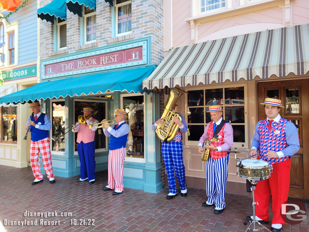 The Straw Hatters performing along Main Street USA