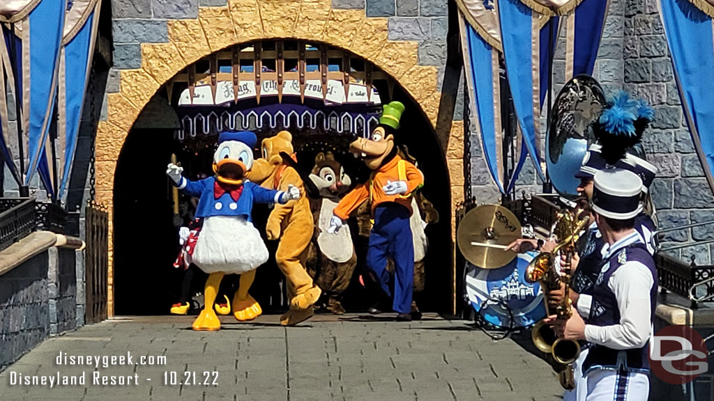 Donald Duck and Goofy lead the Characters out.