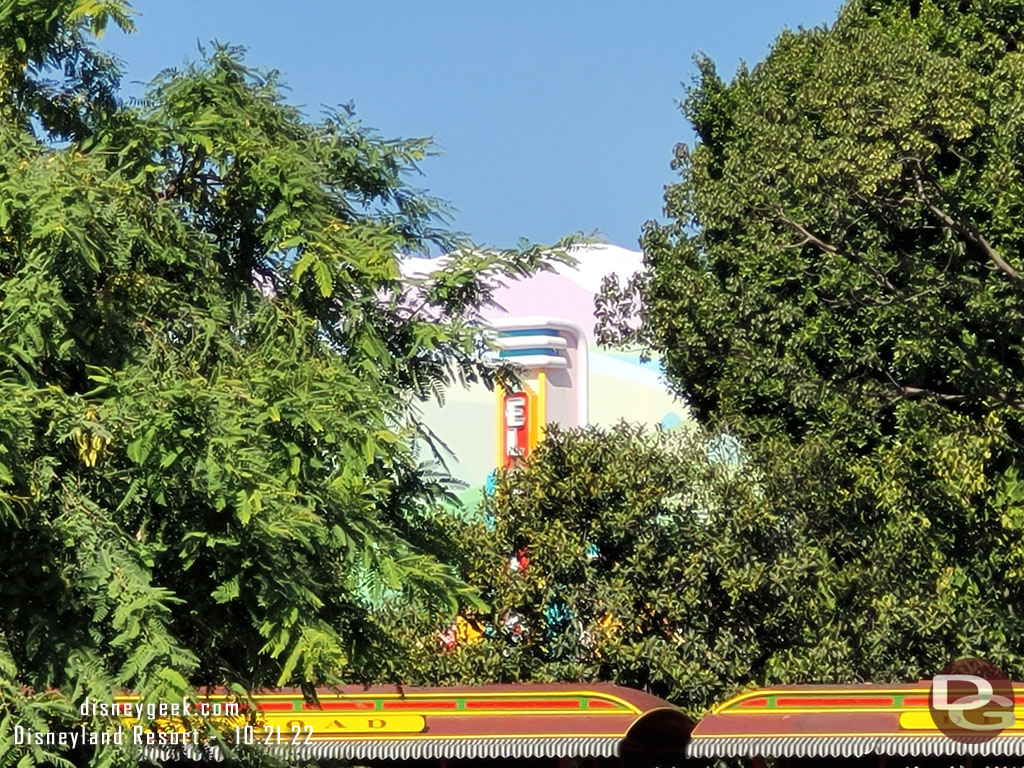 The El Capitoon theater marquee is installed. You can see the few letters through the trees.