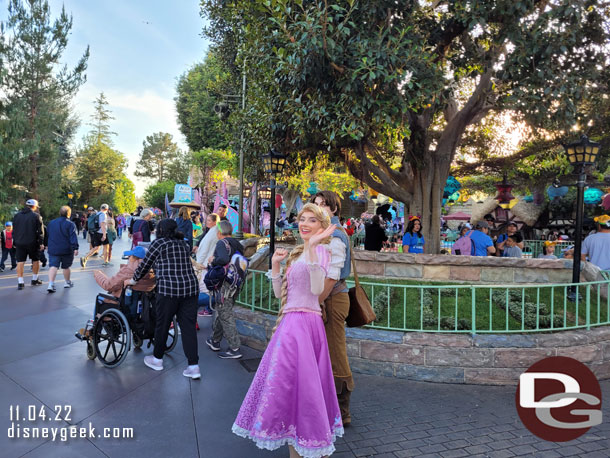 Rapunzel and Flynn walked along side of me. She pointed out Donald Duck (who was meeting guests in the small world mall area).