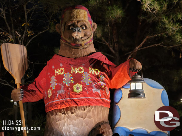 The bear has his sweater on and its lights were on this evening.